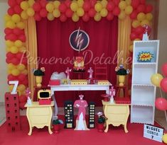 a birthday party set up with balloons and decorations