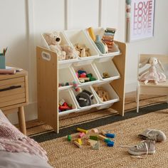 a child's room with toys on the floor