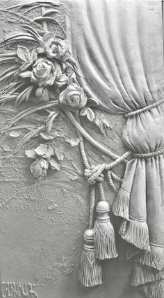 a black and white drawing of curtains with flowers on them in front of a wall