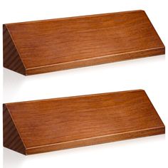 two wooden shelves are shown side by side