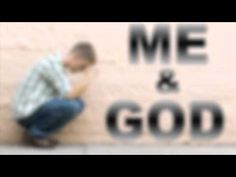 a man sitting against a wall with the words me and god in black on it