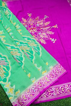 Get ready to wear this stunning Banarasi silk saree. Woven with passion and excellence, this Handloom Banarasi silk saree won't fail to catch attention. Tussar Georgette silk sarees are known for their longevity and resilience, they make you fall in love with them. Color -Green & Purple with hand brush Weave -Cutwork Blouse- Plain with zari border Click here to view underskirt Pista Green Banarasi Silk Pre-draped Saree For Eid, Pista Green Silk Saree With Zari Work, Pista Green Saree With Zari Weaving For Festive Occasions, Festive Pista Green Saree With Zari Weaving, Pista Green Banarasi Silk Blouse With Zari Weaving, Unstitched Pista Green Saree With Zari Weaving, Semi-stitched Silk Saree With Traditional Patterns, Traditional Pista Green Saree With Zari Weaving, Semi-stitched Silk Pre-draped Saree With Traditional Patterns