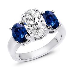 three stone diamond and sapphire ring