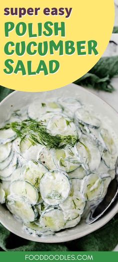 a bowl filled with cucumber salad on top of a table