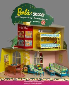 a doll house with furniture and accessories in it