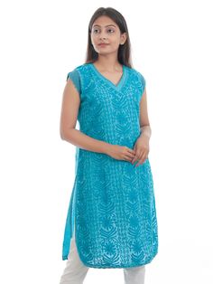 NstoreIN brings beautiful Machine Chikan Embroidered good quality Kurta for women. This classy short kurta is well crafted in fine Cotton for superb softness, comfort, and drape, its embroidered chikankari pattern, regular fit design and trendy shape make it the perfect fashion choice for many an occasion. Pair this short black chikankari kurta with bangle earrings for an elegant look. The lovely design forms a substantial feature of this wear. It looks stunning every time you match it with accessories. Blue Chikankari Embroidery V-neck Kurta, Traditional V-neck Top With Resham Embroidery, Traditional Resham Embroidered V-neck Top, Traditional Chikankari Embroidered Top With V-neck, Traditional Embroidered Top With Chikankari V-neck, Traditional Embroidered V-neck Top With Chikankari, Summer Chikankari Embroidered Fabric, Summer Chikankari Embroidery Fabric, Traditional V-neck Kurta With Self Design