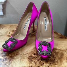 Manolo Blahnik Hangisi Pumps Fuschia Hot Pink Color Made In Italy Size 35.5 New In Box; Never Worn Minor Scuff Near Toe Box From Trying On I’ve Had These For A While But Never Wore Them. They No Longer Fit My Feet. Chic Shoe Clips For Formal Occasions, Pink Formal Wedding Shoes, Pointed Toe Wedding Shoes For Galas, Pink Almond Toe Wedding Shoes For Formal Occasions, Formal Pink Wedding Shoes With Almond Toe, Pink Embellished Wedding Shoes For Formal Occasions, Designer Embellished Almond Toe Heels, Designer Embellished Low Heel Heels, Designer Embellished Low Heels