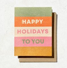 there is a card with the words happy holidays to you written in bold colors on it