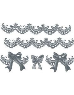 three pieces of metal lace with bows