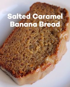 a piece of cake on a plate with the words salted caramel banana bread