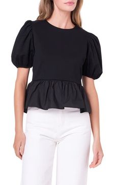 Turn on the charm in this mixed-media top designed with a poplin peplum and puff sleeves. Back keyhole with button-and-loop closure Jewel neck Short sleeves 65% cotton, 35% polyester with 100% cotton contrast Hand wash, dry flat Imported Chic Cotton Puff Sleeve Top With Balloon Sleeves, Chic Cotton Puff Sleeve Top, Chic Cotton Peplum Top With Puff Sleeves, Spring Cotton Peplum Top With Puff Sleeves, Workwear Puff Sleeve Top With Ruffles, Ruffled Puff Sleeve Top For Workwear, Cotton Puff Sleeve Top With Ruffle Hem, Ruffled Puff Sleeve Top For Work, Chic Cotton Peplum Top