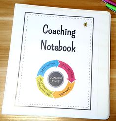 a notebook with the words coaching notebook on it