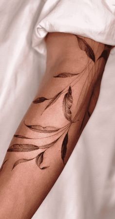 a person with a tattoo on their arm