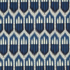 a blue and white pattern on fabric