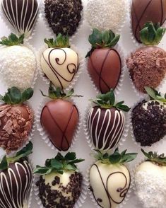 chocolate covered strawberries are arranged in the shape of hearts