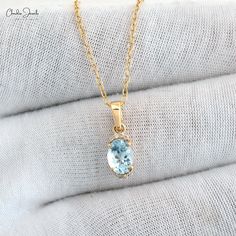 Description Elevate your style with the Natural Aquamarine 0.75 Ct Gemstone and Halfway Diamond Pendant. Crafted in 14k real gold, this unique pendant showcases the serene beauty of aquamarine paired with sparkling diamonds. Perfect for March birthstone jewelry lovers or as an elegant gift. Shine with timeless sophistication and modern elegance! The gold chain shown in pictures is just for reference and display purpose, in order pendant comes with a COMPLIMENTARY 925 SILVER CHAIN. Product Detail Oval Yellow Gold Birthstone Necklace For Anniversary, March Birthstone Jewelry, Pendant Diamond, Wedding Pendant, Aquamarine Pendant, Aquamarine Necklace, Art Deco Pendant, Jewelry Minimalist, Emotional Body