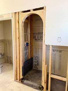 the inside of a house being built with wooden framing and walls in place for insulation