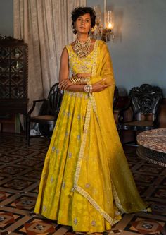 Featuring a lime yellow self woven Russian jacquard lehenga set paired with antique silver zari jaal embroidered blouse and pure tissue dupatta. Jacquard Lehenga, Tissue Dupatta, Blouse Yoke, Royal Indian, 1950’s Fashion, Yellow Lehenga, Jacquard Blouse, Navy Blue Print, Lime Yellow