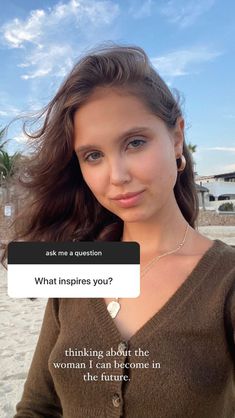 a woman is looking at the camera with an instagramtion on her face that says, what inspires you? thinking about the woman i can become in this question