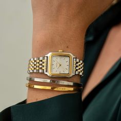 Our designers drew inspiration from the past to infuse a hint of retro charm into this collection. The result is a timepiece that transcends time itself, connecting the past with the present seamlessly. Gold And Silver Watch, Jewelry Hacks, Queens Jewels, Classy Watch, Vintage Watches Women, Gold Watches Women, Retro Watches, Wrist Jewelry, Family Jewels