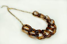 "Tortoise shell Oversized Chain Chunky Statement Necklace - Stone material: Chain, Acrylic links - Lobster clasp closure - Necklace Length: approx. 56cm(22\") with 2 inch extension - Weight: Around 70g There might be a little difference of the colors due to the camera or light. All jewelry comes in a gift box with my brand logo. Carefully shipped in a bubble wrap mailer. This jewelry will be gift-wrapped in an elegant gift box and shipped to you via registered mail (with tracking number) in a pr Brown Chain Necklace For Party, Chunky Statement Necklace, Necklace Stone, Party Necklace, Stone Material, Necklace Fashion, Bridesmaid Necklace, Necklace Statement, Bib Necklace