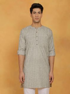 VASTRAMAY Men's Green Cotton Kurta Comfortable and stylish, this kurta is perfect for everyday wear. Made from pure cotton for breathability. Features a mandarin collar, button placket, and long sleeves. Dry clean recommended. Key Features Mandarin collar Long sleeves Straight hem Comfortable cotton fabric Specifications Neck: Mandarin Collar Sleeves: Long Sleeves Length: (depending on the specific kurta) Knee-length or Waist-length Material & Care Material: Cotton (or Cotton Blend depending on Cotton Kurta, Mens Green, Packaging Labels, Waist Length, Product Images, Green Cotton, Mandarin Collar, Button Placket, Pure Cotton