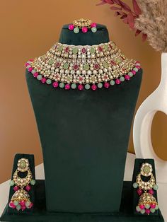 Bollywood style kundan necklace set in hot Pink, Pista and Ruby red color combination. This Heavy choker style kundan necklace set has premium quality kundan with beautiful pearl details to give your elegant and glam look on your wedding.  All orders Ship same day if placed before 4:00 PM EST  Earring Length: 3.25 inch Earring Width: 0.75 inch Necklace Length: Choker necklace with dori closure. Mnagtika Length: 7 inch Create beautiful memory for any occasion with elegant jewelry for your loved o Jewelry Indian Wedding, Red Color Combinations, Jewelry Pakistani, Kundan Necklace Set, Kundan Jewelry, Kundan Necklace, Bollywood Style, Necklace Bridal, Indian Wedding Jewelry