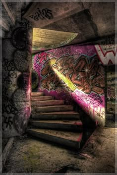 the stairs are covered in graffiti and spray paint