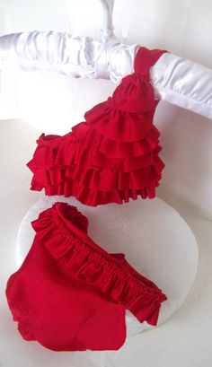 "Ruffles, ruffles, ruffles....your dog will be loved in this beautiful ruffle red bikini. Just sit by the pool or at the beach and enjoy the stares Red ruffle top attaches at one shoulder. Red ruffle bottom skirt...just adorable! Please feel free to check the reviews on this item and many other items...Just click on this link : https://www.etsy.com/shop/BellaDoggie/reviews SPECIAL SET PRICE: for set of bathing suit, hat and towel. To order the set click: https://www.etsy.com/listing/234643300/do Red Ruffled Swimwear For Beach Season, Red Ruffled Swimwear For Beachwear, Red Ruffled Swimwear For Vacation, Red Ruffled Swimwear For Beach, Party Red Ruffled Swimwear, Red Ruffled Swimwear, Red Ruffled Party Swimwear, Red Ruffle Top, Suit Hat