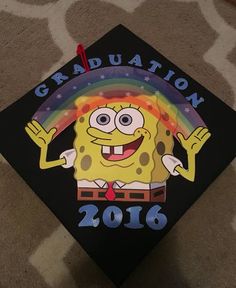 a graduation cap with a cartoon character on it and the words gradulation 2016