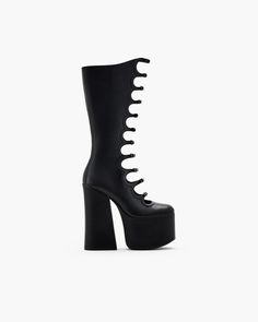 First debuted on the Fall '16 runway, the original Kiki boots quickly made waves all over the industry. At 6" tall with a 3" platform, the runway icon is reimagined as a knee-length boot and is complete with a rounded toe and the signature multi-straps at front. | MARC JACOBS The Kiki Knee-High Boots in Black, Size 37 Kiki Boots, Mini Duffle Bag, Marc Jacobs Shoes, Bow Skirt, Leather Billfold, Knee Length Boots, Sunglasses Strap, Sack Bag, Small Tote Bag