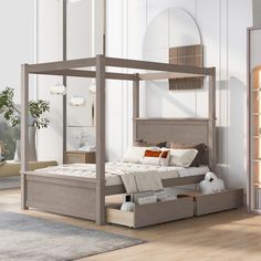 a bed that is sitting in the middle of a room with white walls and wooden floors