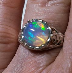 Stunning Natural Opal Art Nouveau Style Ring, 9mm Round Ethiopian Opal,  See Video! 925 Sterling Silver Floral Setting, Size 6.25. Velvet Ring Box Included. Iridescent Sterling Silver Round Jewelry, Iridescent Round Sterling Silver Jewelry, Formal Silver Opal Cabochon Ring, Formal Silver Cabochon Opal Ring, Classic Handmade Opal Ring, Nickel Free Sterling Silver Opal Ring, Nickel-free Silver Opal Ring For Anniversary, Hallmarked Opal Ring For Anniversary, Classic Handmade Round Opal Ring