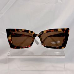 Nwot Retro Cats Eye Sunglasses. Frames Are Browns And Dark Orange Marble. Trendy Orange Cat Eye Sunglasses With Tinted Lenses, Brown Cat Eye Sunglasses For The Beach, Brown Cat Eye Sunglasses For Beach, Trendy Brown Cat Eye Sunglasses, Trendy Orange Tinted Cat Eye Sunglasses, Casual Orange Cat Eye Sunglasses For Summer, Retro Brown Cat Eye Sunglasses For Beach, Retro Orange Cat Eye Sunglasses, Trendy Orange Cat Eye Sunglasses With Uv Protection