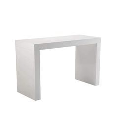 a white table that is on top of a white floor and it has an open end section