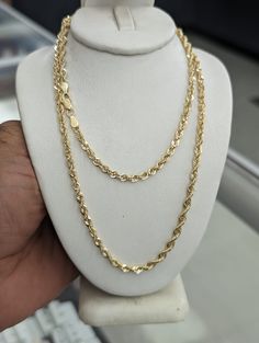 10kt real gold rope chain 3.2 mm thick Light weight style Hollow Style  Shiny sparkling chain Available size and estimated weights minor variation possible in weight  8 inch bracelet.  Weight 2.2 gm 9 inch bracelet.  Weight 2.32 gm 18 inch  chain.     Weight 4.30 gm 20 inch chain      Weight 4.76 gm 22 inch chain.      Weight 5.35 gm 24 inch chain.      Weight 5.75 gm 26 inch chain.     Weight 6.32 gm Please check picture carefully to understand thickness of chain 100% Authentic gold  Never change color or never fade never tarnish Not a gold plated or not a gold filled Simple Gold Chains For Sarees, Rope Chain Gold, Authentic Gold, Real Gold Chains, Gold Rope Chains, Graduation Outfit, Never Change, Rope Chain, Real Gold