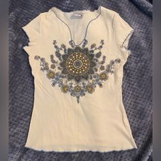 Perfect Condition! Very Cool! Beaded Festival Style Top In Off White, Blue, Brown And Gold . Such A Cool Top That I Never Even Got To Wear! It Has Blue Thread Trim Along The Edges And A Super Cute Pattern On It. Is Definitely Festival Style With A Cute Felt Hat Or Could Be Western With Boots And A Cowboy Hat. Sz M Juniors Save $3 On Shipping If You Message Me Smoke Free Home. Like It? Make An Offer Or Ask Any Questions. Thank You Festival Style, Felt Hat, Cowboy Hat, Blue Cream, Cute Pattern, Festival Fashion, Blue Brown, Cowboy Hats, White Blue