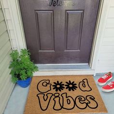 a door mat that says good vibes on it