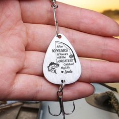 a person holding a fishing lure in their hand with the caption after 10 years, all the greatest mullets are gone