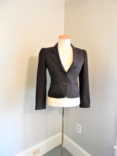 "Vtg 1970's Ladies Short Wool Jacket, Vtg J. Gallery Tailored Wool Ladies Jacket, Vtg Preppy Wool Herringbone Dark Brown Jacket sz 4/5 I love this vintage tailored fit shorty jacket by J. Gallery. I was made in the late 1970's and is very nice quality. The fabric is a dark brown wool blend in a herringbone pattern with a burnt orange in the dark brown. A very classy little jacket perfect for your wardrobe. Dress this up or down! I love versatile pieces and this jacket is a great one. Fully lined Dark Brown Jacket, Ladies Blazers, Beaded Jacket, Ladies Short, Brown Jacket, Womens Blazers, White Jacket, Herringbone Pattern, Wool Jacket