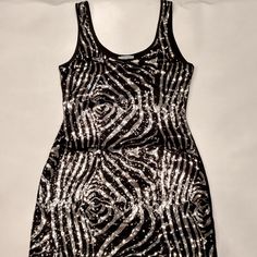 Do & Me Sleeveless Sequin Mini Dress Black And Silver Sequin Mini Dress Front Of Dress Is Sequin, Back Is All Black Sleeveless Dress With Round Neckline 32" Length From Strap To Hem Nwot Metallic Sleeveless Party Dress, Silver Sleeveless Sequin Party Dress, Metallic Sleeveless Sequin Dress For Party, Metallic Sleeveless Sequin Dress For Party Season, Metallic Sleeveless Sequin Party Dress, Metallic Sleeveless Mini Dress With Sequins, Glamorous Sleeveless Mini Dress With Sequins, Metallic Sleeveless Dress For Party Season, Sequin Sleeveless Mini Dress For Night Out