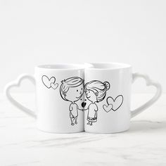 two white coffee mugs with black and white drawings of children holding hearts on them