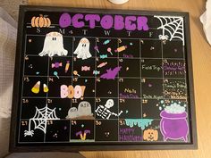 a calendar with halloween stickers on it