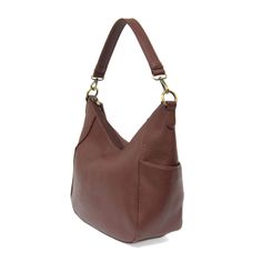 Zipped up to keep your belongings stowed safely! This super versatile hobo bag in tumbled vegan leather has not one but two included detachable shoulder straps and can be worn as a crossbody or a short shoulder. Pair with one of our new guitar straps for the ultimate boho style! 11" high, 13" wide, 4" deepRemovable short shoulder strap drop: 11"Removable and adjustable shoulder strap drop: 22-28"Magnetic snap closureExterior back zip pocketBrass plated hardware100% vegan leather (polyurethane)Ma Everyday Hobo Bag With Zipper Closure, Everyday Use Hobo Bag, On-the-go Hobo Bag, Hobo Shoulder Bag With Adjustable Strap, Classic Hobo Bag With Zipper Closure For Everyday Use, Hobo Bag With Removable Pouch For Everyday Use, Fall Casual Hobo Bag With Adjustable Strap, Hobo Bag With Detachable Strap For On-the-go, Hobo Bag With Detachable Strap