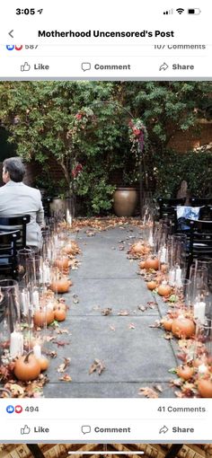 an outdoor ceremony with candles and pumpkins