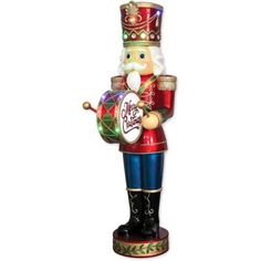 a christmas nutcracker figurine holding a drum