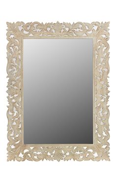 an ornate white mirror with leaves on it's sides and a light colored frame