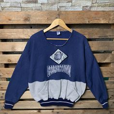 Vintage NCCA Georgetown Hoyas Sweatshirt Georgetown Pullover Sweater Georgetown Crewneck Jumper Georgetown Hoyas Embroidered Logo Blue Navy Color Brand Name :-   📌 Tag Size :-  Large 📌 Recommend Size :- Large Manual Measurement :- WIDTH (armpit to armpit) :- 21 inches / 53cm LENGTH (shoulder to end of garment) :- 25.5 inches / 65cm Condition :- Good Condition 7/10. Minor Defect Stain Refer Picture. 📮FED EX / DHL EXPRESS = 3-6 business day arrived Varsity Crew Neck Sweater With Embroidered Logo, College Crew Neck Sweater With Embroidered Graphics, Collegiate Crew Neck Sweater With Embroidered Logo, Collegiate Cotton Crew Neck Sweater, Georgetown Hoyas, University Sweatshirts, Navy Color, Vintage Sweatshirt, Pullover Sweater