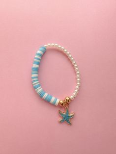 Heishi, Pearl and Starfish detail bracelet Beachy Bracelet Ideas Clay Beads, White Starfish Charm Bracelet, Starfish Charm Bracelet As Gift, White Starfish Bracelet With Ocean-inspired Style, White Ocean-inspired Starfish Bracelets, White Starfish Ocean-inspired Bracelet, Ocean-inspired White Starfish Bracelet, Beach Bracelet Ideas, Beach Bracelets Diy