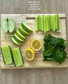 the cutting board has several different fruits and vegetables on it